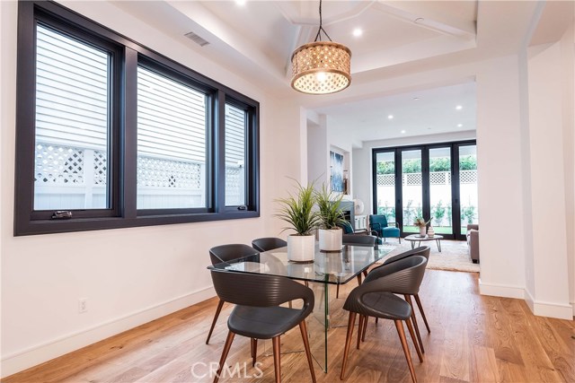 An open dining room with lots of natural light.