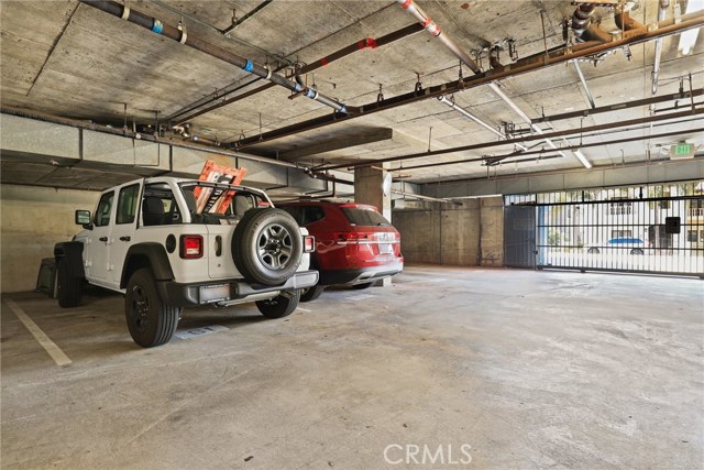 Subterranean Secure Gated Garage with 2 side by side spaces (space #61/62) with some space behind cars to place bikes, boards if need be.  You also have an ample private storage on your floor down from your unit!