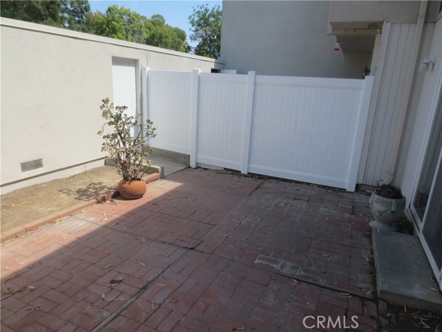 Rare large patio note size of neighbor's patio beyond fence