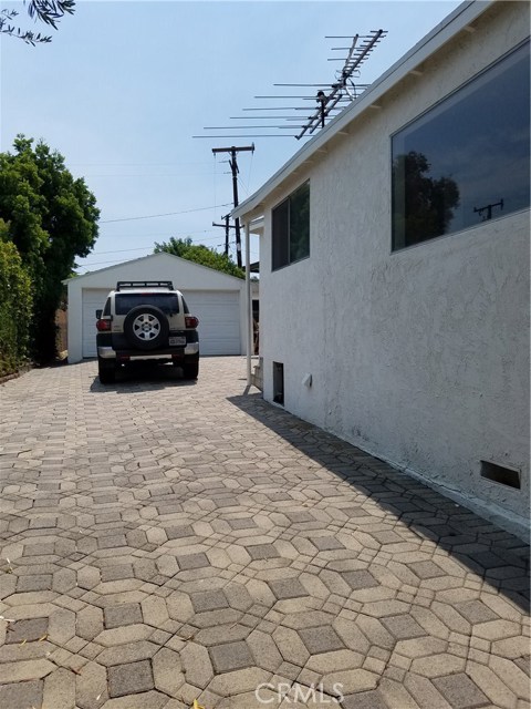 Side Entrance & Separate 2 Car Garage