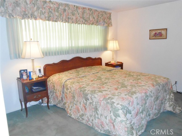 Fully Carpeted, Vertical Blinds and Custom Valance.