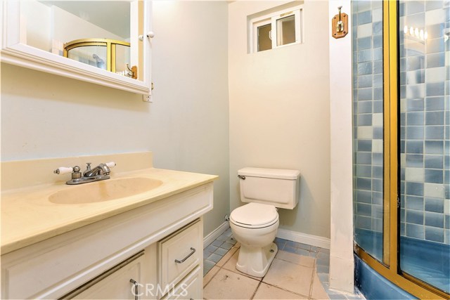 The 3rd bathroom adjoining the guest bedroom is clean and efficient as an area separate from the main home.