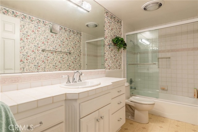 Hallway  Full Bath with Glass Doors in Shower/Tub