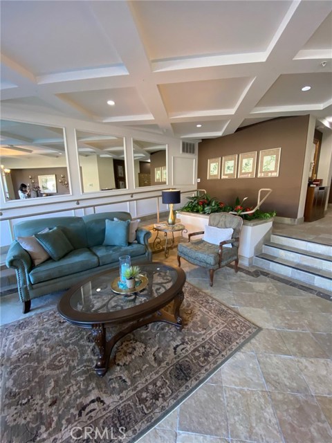 Front Entrance with Comfortable Couches & Chairs.