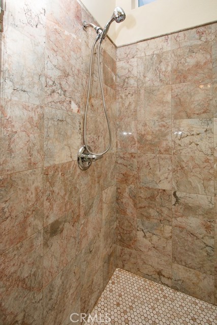 Shower with marble tile