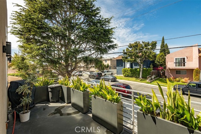 Spacious deck directly off of the kitchen and living room is ideal for outdoor dining and summer BBQs
