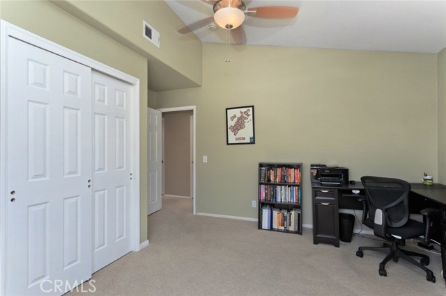 Bedroom #3 with closet and vaulted ceilings.