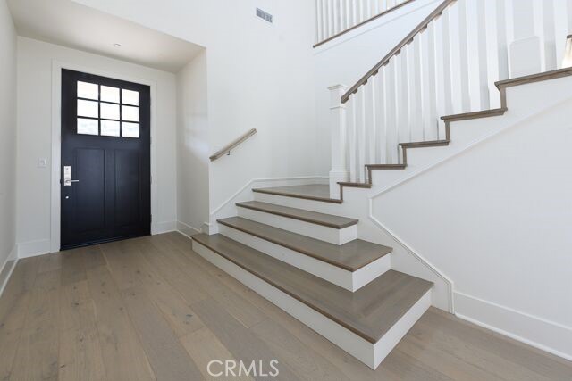 Pretty two-story entry of Chadmar's C1 floorplan.