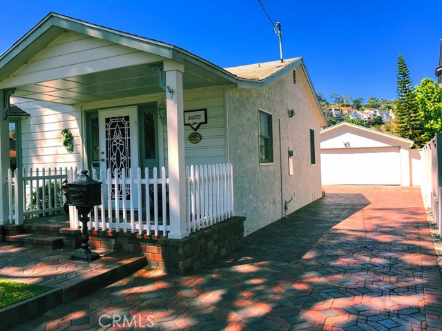 Paved Courtyard leading to Garage