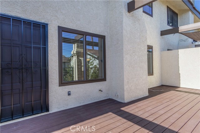 front door and entrance with recently upgraded trex composite private deck