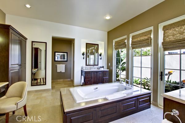 There is a secret garden entrance from the master bath to the private outdoor Jaccuzzi-type Spa.