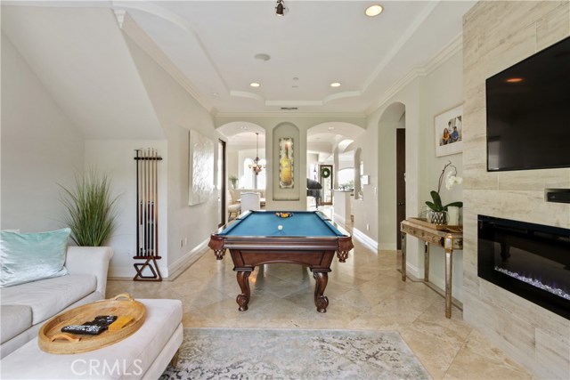 Game/TV Room with Fireplace