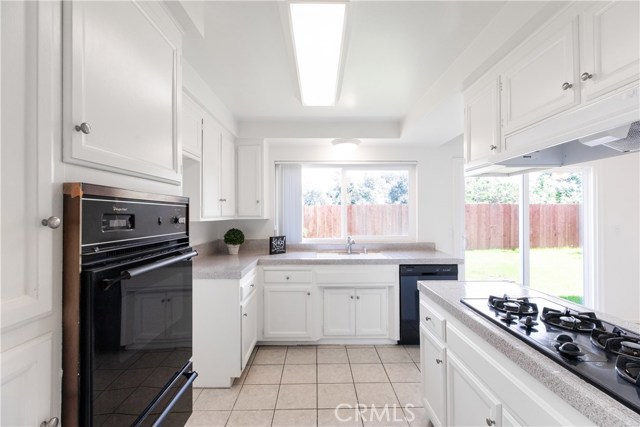 The kitchen has new countertops and includes built in range, oven and dishhwasher.