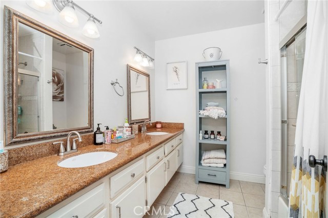 one of the 2 full bathrooms of this unit