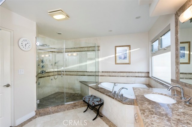 Master ensuite bathroom with double sinks, huge shower with 4 wall sprayers and jetted tub