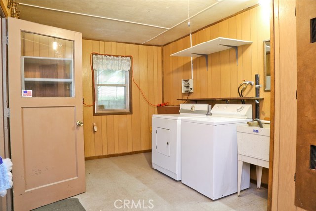 Large Utility Room opens to Workshop