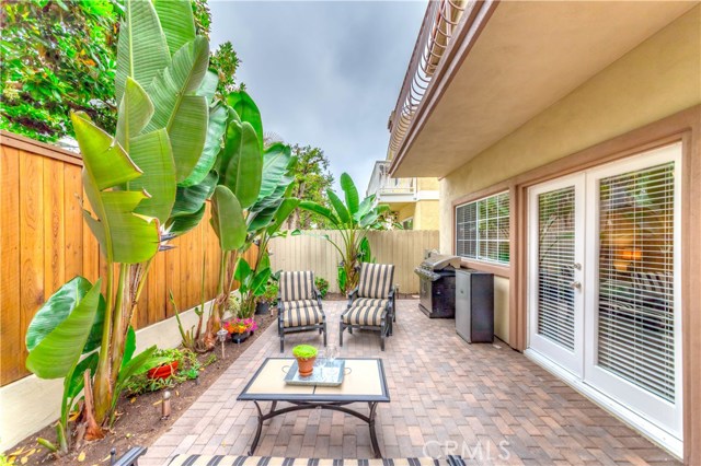 Serene rear patio with stone pavers, 20amp outlet and gas line for nonstop BBQ