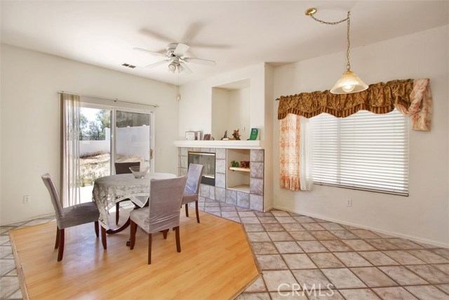 Cozy family room off the kitchen with a burning fireplace