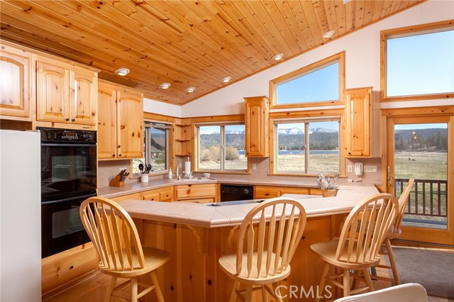 Large kitchen with plenty of cabinets for storage.