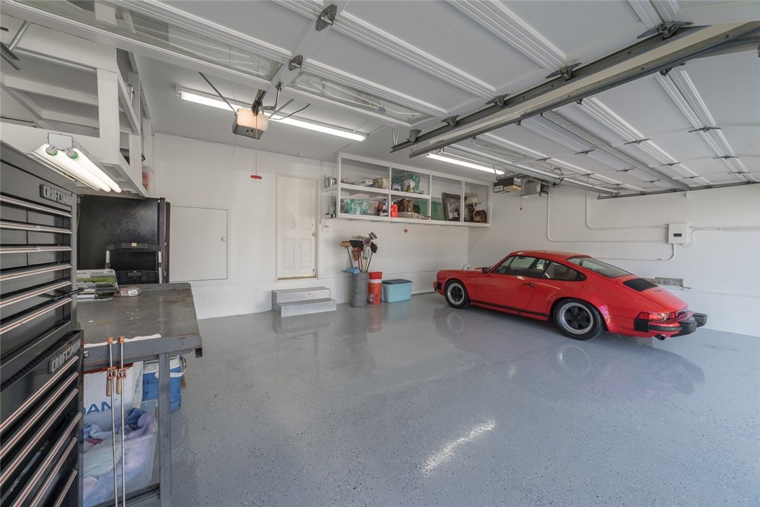 New epoxy showroom finish with plenty light and storage too in your three car garage...