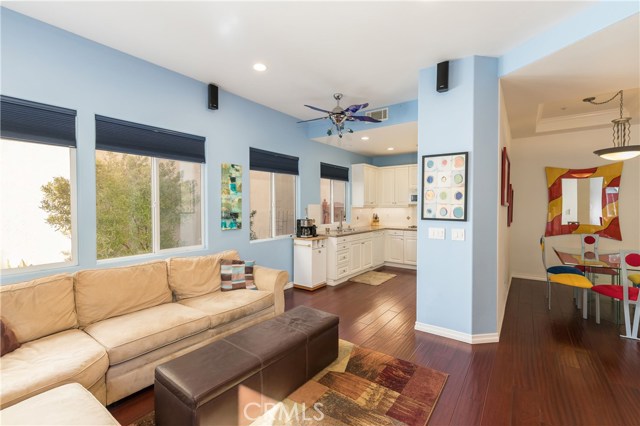 Family Room Looking to Side Yard, Kitchen & Dining Room