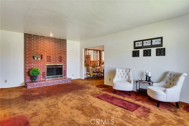 Living Room. HARDWOOD FLOORS are under the carpet!