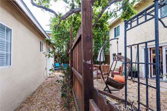 Interesting shot here...this shows you the patio for Unit #2 on left of the fence and the private patio for the main house on the right of the fence.