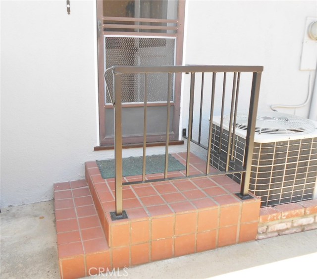 Better View of that Tiled Stairway and AC Unit...Summer is literally a couple weeks away!