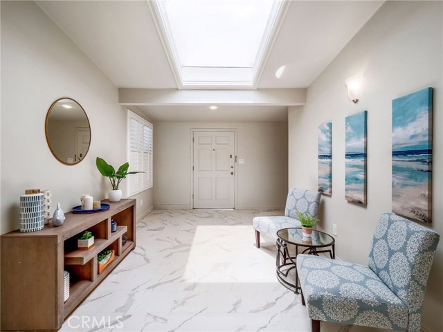 Foyer / Sunroom looking back at front door