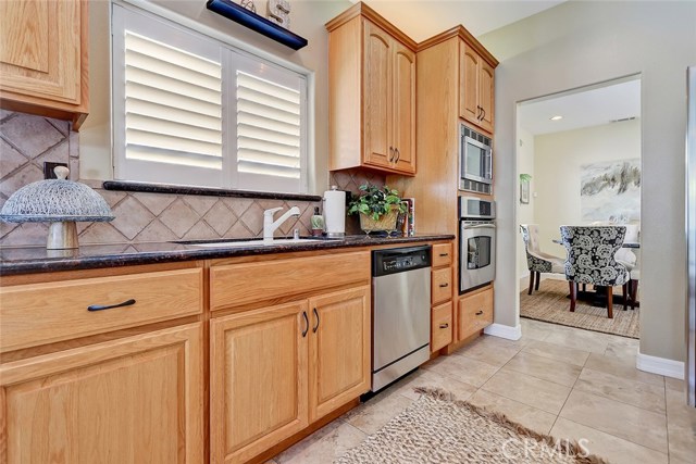 Stainless steal appliances and dual kitchen sink.