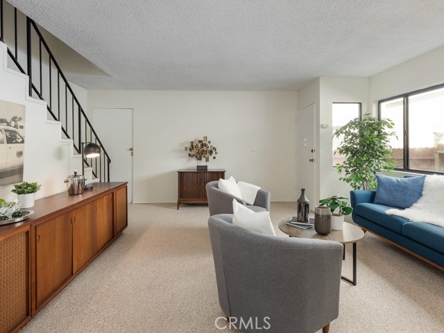 Looking at the Living/Family with Entry door.