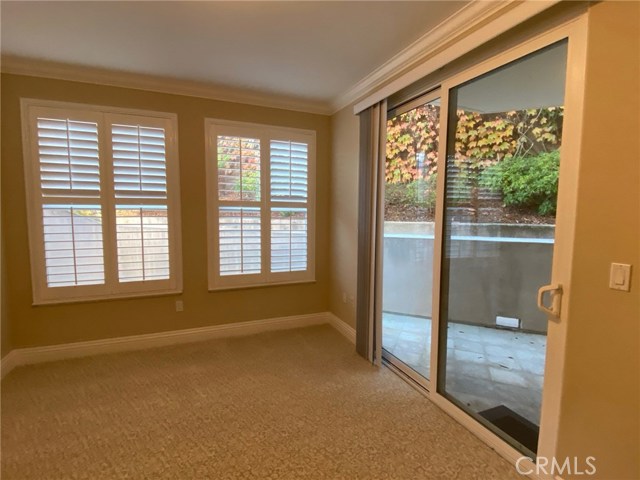 Master Bedroom has Sliding Glass Doors leading out to the Backyard.