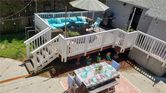 Yard and deck from above. Spacious and great for entertaining.