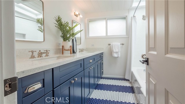 Downstairs hall bath with dual sinks
