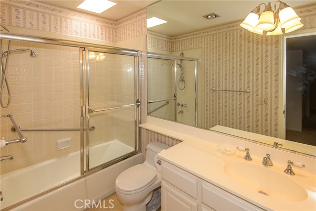 2nd bath with tiled tub/shower combination!