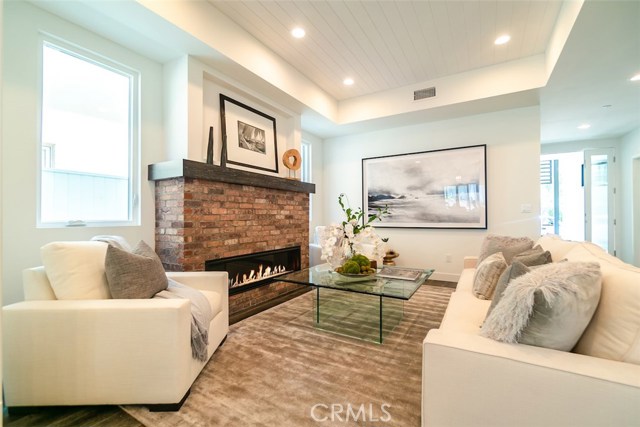 Great room with hand-crafted brick fireplace makes the perfect touch for family entertaining