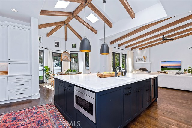 Kitchen with view of additional dining area.