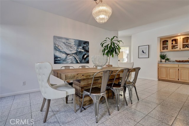 Formal Dining Room Area with Adjacent Wet Bar