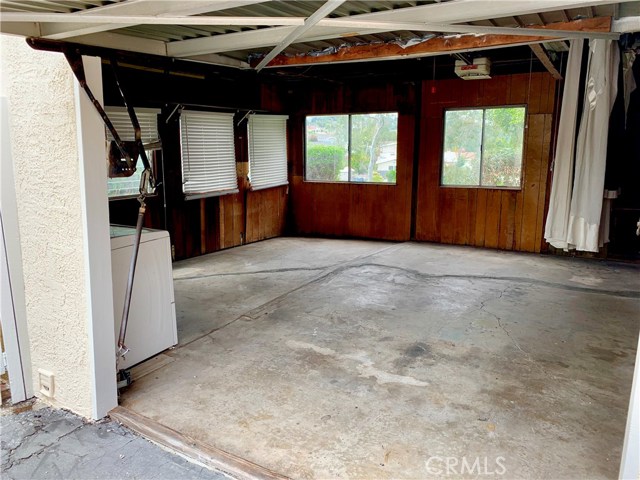 Large garage has windows, perfect for bonus living space or man-cave.