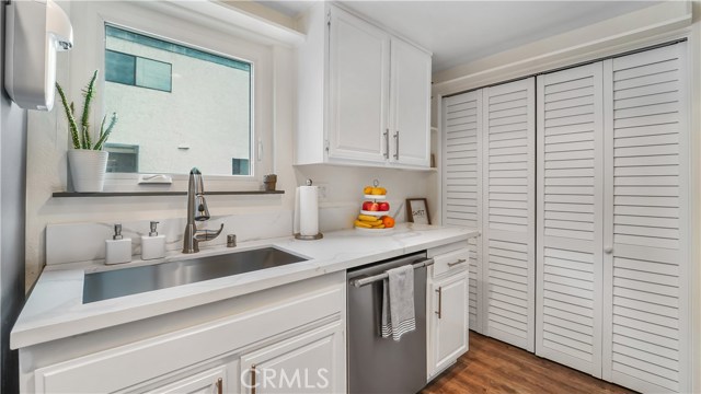 Stainless sink and dishwasher, new window and doors for laundry area