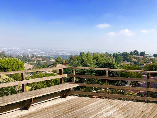 Panoramic views of downtown, city, mountains and canyons - from the deck and the family room, living room, dining room, master and second bedroom.