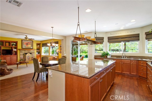 Greatroom design with kitchen open to a small dining area and the Family Room. Spectacular views too!