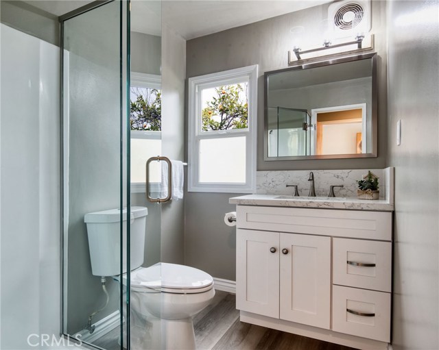 MASTER BATHROOM - FRAME-LESS SHOWER ENCLOSURE, NEW CABINET/QUARTZ TOP, SATIN NICKEL FRAMED VANITY MIRROR, LED LIGHTING