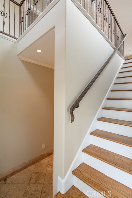 The inviting living room on the upper level lives light and bright, and always something to look forward when you come home.
