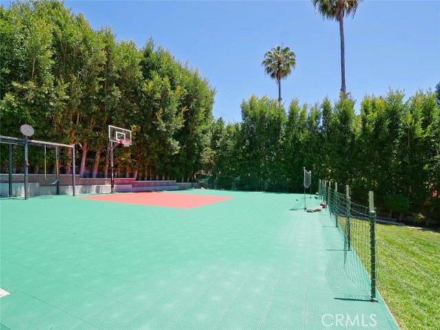 Sports Court with Basketball Hoop & Swing Set