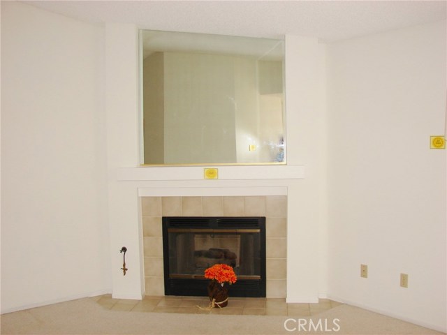 VIEW INSIDE LIVING ROOM WITHOUT FURNISHINGS.