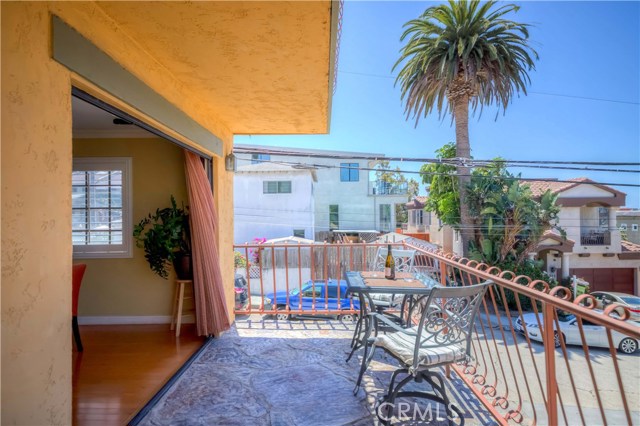 Extra large lower balcony off of kitchen area.  Measuring ~ 20' x 8' (buyer to verify)