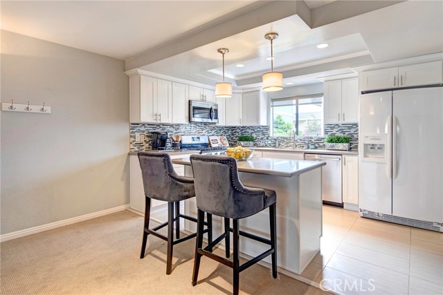 Stunningly remodeled, all stainless stove, dishwasher (near new), and microwave. Stone counters, glass tile backsplash, farm sink, soft close cabinets and drawers. Fantastic breakfast bar/counter. Stunningly remodeled, all stainless stove, dishwasher (near new), and microwave. Stone counters, glass tile backsplash, farm sink, soft close cabinets and drawers. Fantastic breakfast bar/counter.