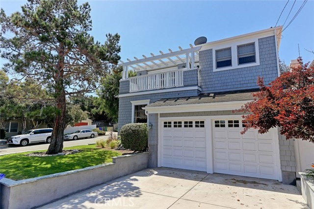 Two car garage with two car parking in driveway.