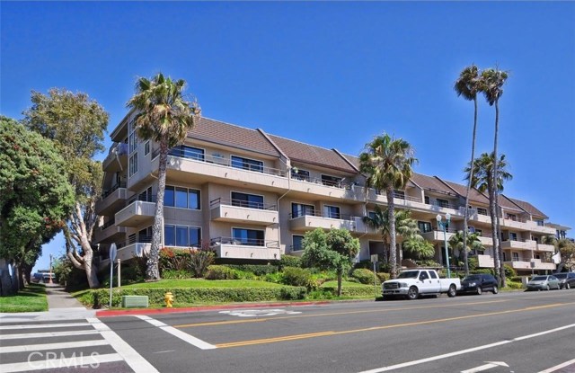 Front of the building. The subject property is located on the third floor (top floor) to the left. The trees (also on the left) on Topaz street provide great privacy